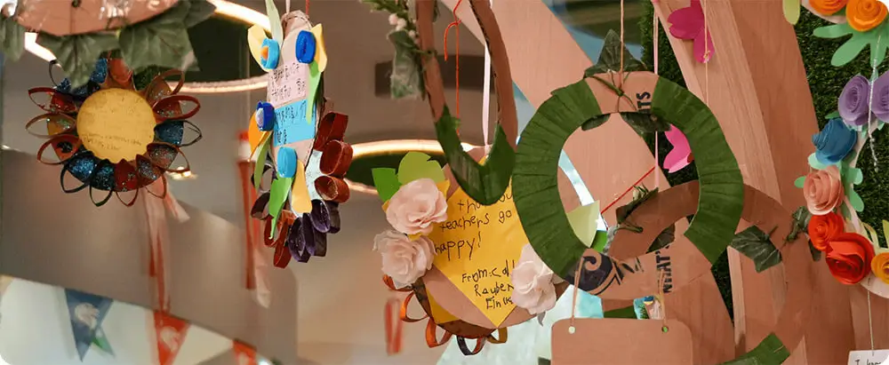 Image of kids craftwork hanging from ceiling